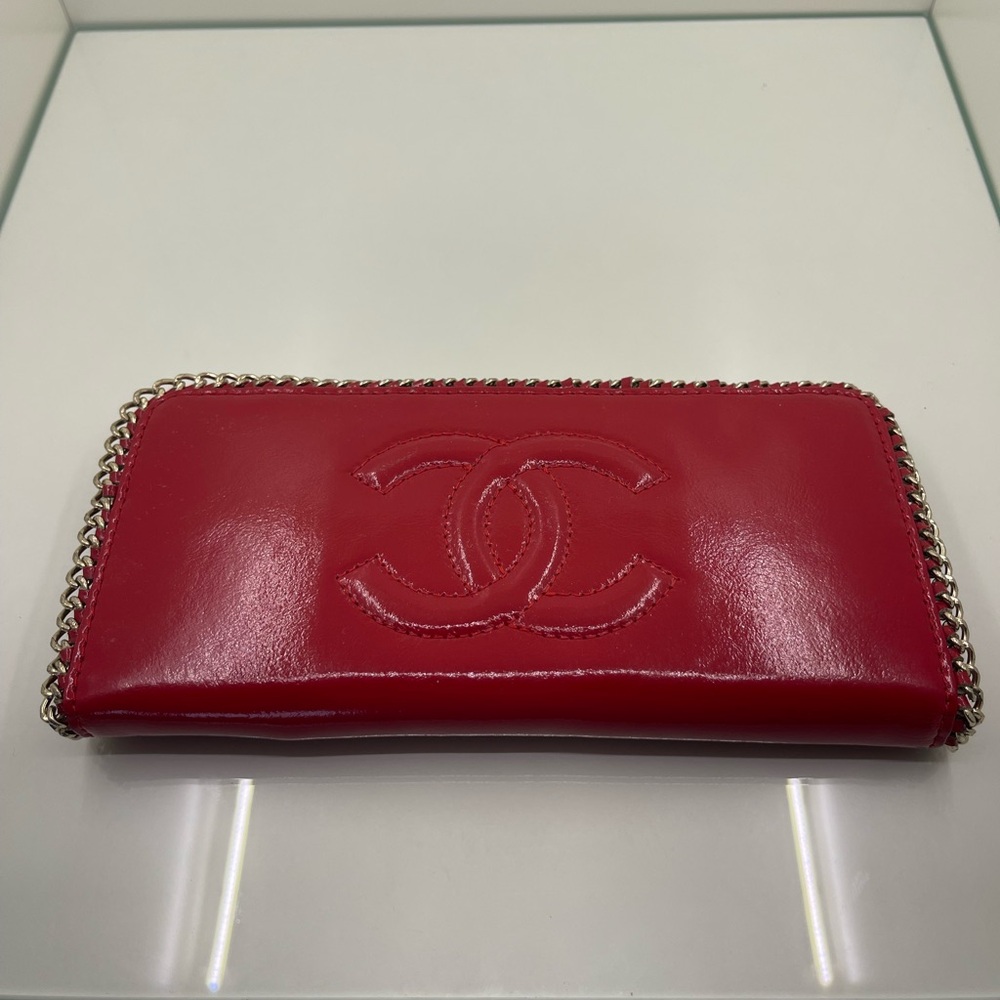 CHANEL Red Quilted CC Logo Zip Around Wallet with Chain Trim